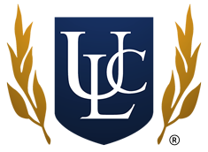 The logo of the Universal Life Church: A blue shield between gold branches with the letters ULC